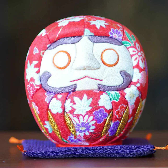 daruma doll, daruma doll meaning, which eye to paint daruma, daruma eyes, daruma colors meaning, red daruma, gold daruma, black daruma, Japanese good luck charm, Bodhidharma doll, how to use a daruma, daruma disposal, daruma burning ceremony
