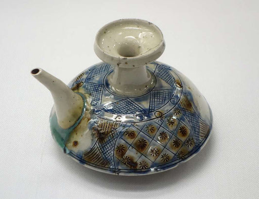 Okinawa pottery, Ryukyu ceramics, Yachimun ware, Tsuboya kilns, Okinawan pottery village, traditional Japanese pottery, arayachi unglazed pottery, joyachi glazed ware, shisa lion statues, red clay roof tiles, Okinawan ceramic history