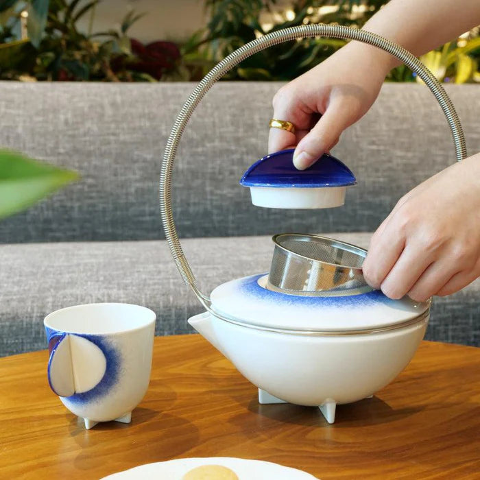 Japanese porcelain teapot, Imari Arita ware teapot, Studio Wieki Somers teapot, modern Japanese teapot, porcelain teapot with handle, designer Japanese teapot, cobalt blue teapot, lapis lazuli porcelain teapot, Japanese tea ceremony teapot, Imari porcelain tea set, Saga Prefecture porcelain, Japanese pottery collaboration, contemporary Japanese teaware, handmade porcelain teapot, luxury Japanese teapot.