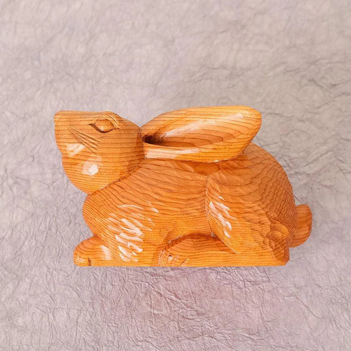 Ichii Itto Bori, Hiroshi Washizuka, Japanese wood carving, rabbit figurine, yew wood sculpture, traditional Japanese crafts, Hida region carving, hand-carved rabbit, Japanese folk art, wooden animal statue, Japanese lucky charm, Japanese prosperity symbol, handmade wood decor, collectible wooden figurine, Japanese artisan crafts, Japanese home ornament