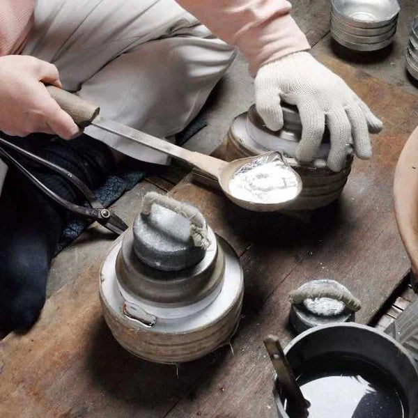 Japanese tea set, ibushi tin tea set, Osaka Naniwa pewter ware, Japanese pewter tea cups, handmade Japanese tea set, traditional tea ceremony set, Japanese tea caddy, Japanese tin teapot, artisan tea set Japan, paulownia wood box tea set, Edo period tea ware, pewter tea set Japan, Japanese tea culture, Japanese traditional crafts, Osaka Suzuki tea set.