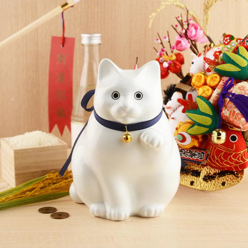 Maneki Neko coin bank, porcelain lucky cat bank, Hizen Yoshida Ware Maneki Neko, KataKoto beckoning cat, Japanese money box cat, black Maneki Neko bank, white Maneki Neko bank, Japanese store opening gift, ceramic cat coin bank, traditional Japanese porcelain cat, chubby lucky cat figurine, handcrafted Maneki Neko Japan, black gold lucky cat ornament, white navy Maneki Neko money bank, Japanese prosperity charm, artisan porcelain Maneki Neko.