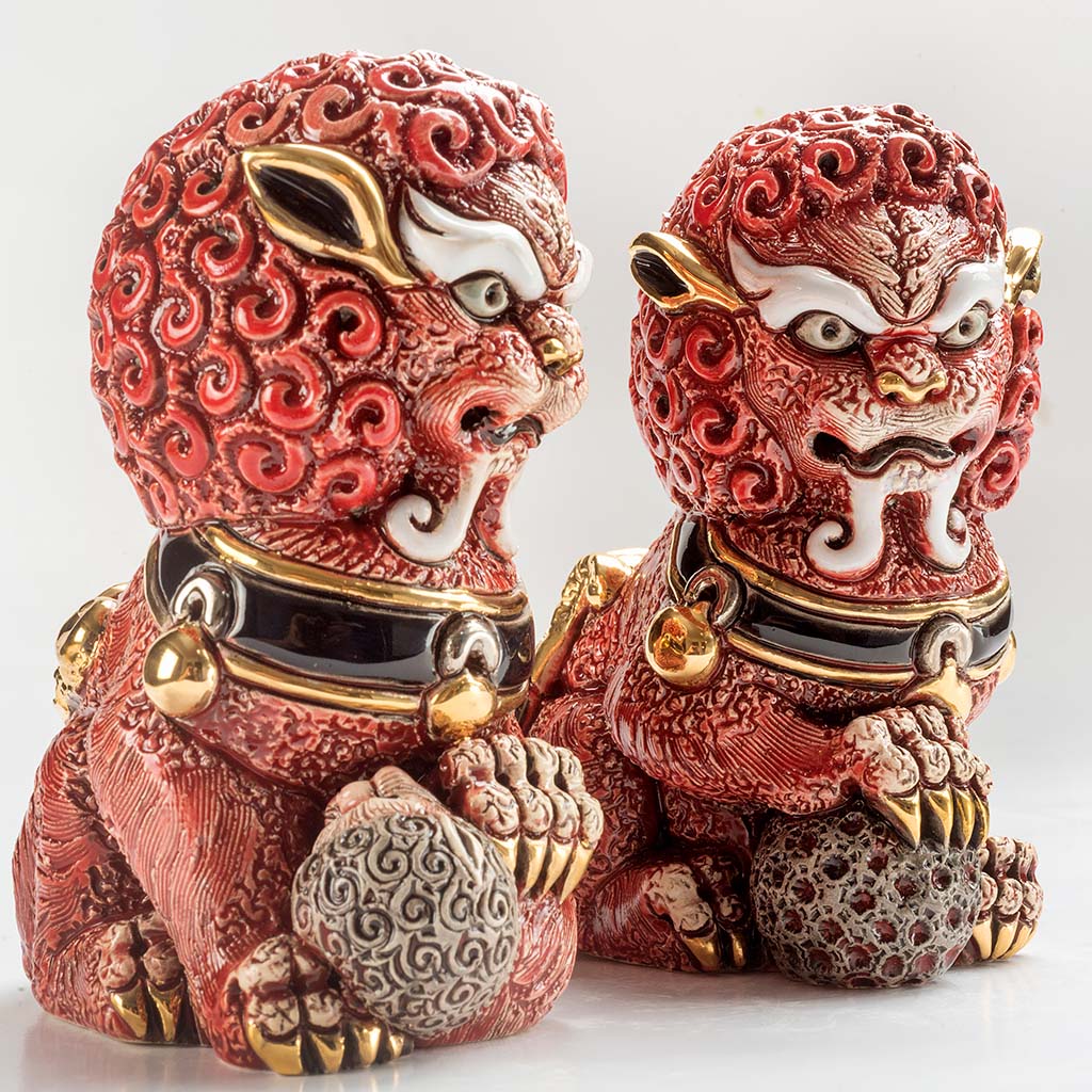 Pair of ceramic Foo Lions hand-carved, soft earthy tones. Detailed mane and poised stances, Chinese feng shui. Lion set for home, office, entryway décor. Hand‑Carved Foo Dog Statue. Lion Figurine. Foo Lion Sculptures. Lion Table Décor