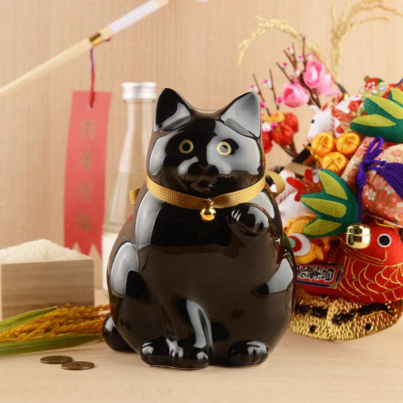 Maneki Neko coin bank, porcelain lucky cat bank, Hizen Yoshida Ware Maneki Neko, KataKoto beckoning cat, Japanese money box cat, black Maneki Neko bank, white Maneki Neko bank, Japanese store opening gift, ceramic cat coin bank, traditional Japanese porcelain cat, chubby lucky cat figurine, handcrafted Maneki Neko Japan, black gold lucky cat ornament, white navy Maneki Neko money bank, Japanese prosperity charm, artisan porcelain Maneki Neko.