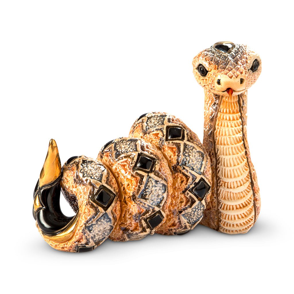 Artisan Ceramic Snake Sculpture. Hand‑Painted Coiled Snake Figurine. Gold‑Accent Ceramic Snake Decor. Enamel Glazed Snake Statue. Uruguayan Craft Ceramic Serpent. Hand‑Carved Snake Home Accent. Snake Transformation Symbol Figurine. Tabletop Ceramic Animal Sculpture