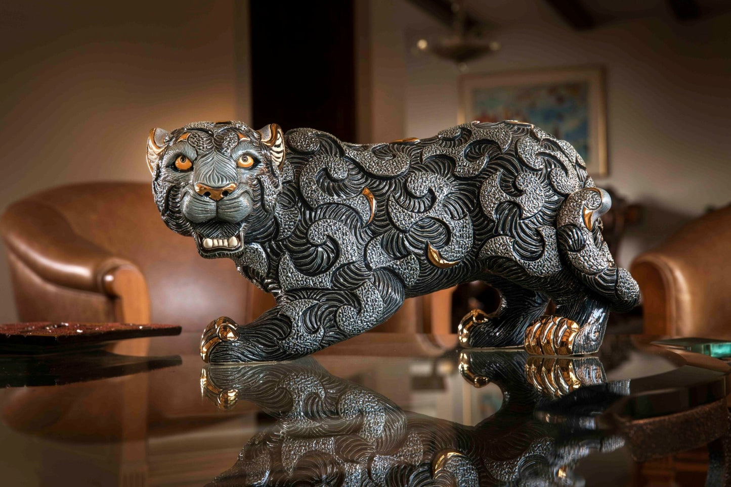 Ceramic panther; fine animal figurine and decorative sculpture. Hand-painted detailing, gold and platinum accents, and limited edition. High-end animal sculpture, symbolic art piece, and heritage ceramic. Ideal for luxury interiors, classic decor themes, or cultural collections, it also appeals to those interested in animals with mythic or spiritual significance