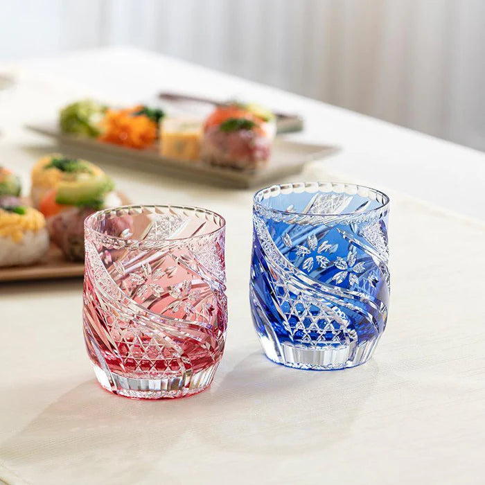 Edo Kiriko whiskey glasses, Sakura Nagare glass, Kagami Crystal Japan, Japanese cherry blossom glass, red and blue whiskey tumblers, Edo cut glass pair, handcrafted Japanese glassware, whiskey glass Edo Kiriko, sake glass Japan, Kagome cut pattern, Kiku Tsunagi design, Japanese crystal barware, cherry blossom whiskey glass set, luxury Japanese drinkware