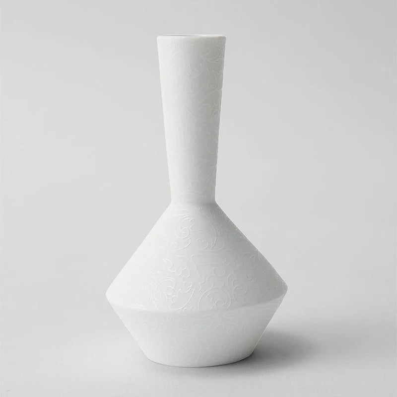 Foo Tokyo porcelain vase, Japanese porcelain flower vase, Mino Gifu handcrafted vase, acanthus motif vase, karakusa pattern vase, gray porcelain vase Japan, white porcelain vase Japan, modern Japanese home decor, single flower porcelain vase, minimalist Japanese vase, artisan handmade porcelain vase, symbolic Japanese ceramic, contemporary Japanese pottery