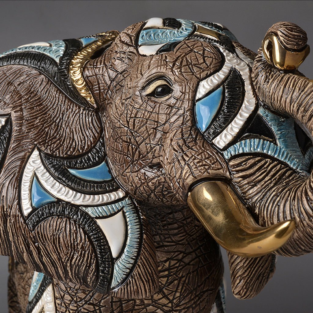 This collectible elephant sculpture suits lovers of wildlife art, fine ceramics, and limited-edition home accents. It appeals to collectors of animal figurines, art gallery pieces, and handcrafted décor. Ceramic elephant statue, limited edition wildlife sculpture, handmade animal art.