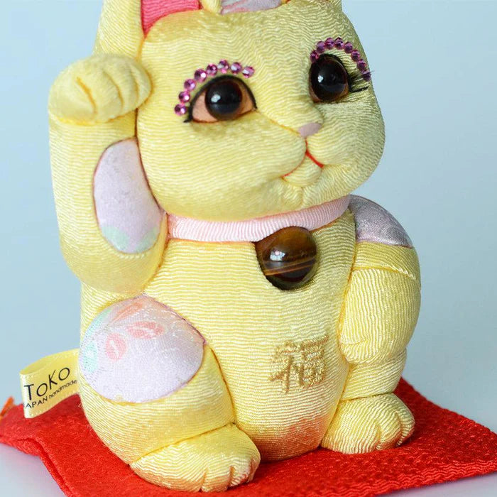 Maneki Neko Feng Shui, Feng Shui lucky cat, Edo Kimekomi beckoning cat, Japanese Feng Shui cat figurine, handcrafted lucky cat, Kakinuma Dolls Maneki Neko, Japanese prosperity charm, Feng Shui wealth cat, Japanese fabric Maneki Neko, traditional Japanese lucky cat, small Japanese lucky figurine, beckoning cat for health and wealth, Maneki Neko meaning colors, lucky cat for home and business, artisan Japanese lucky cat.