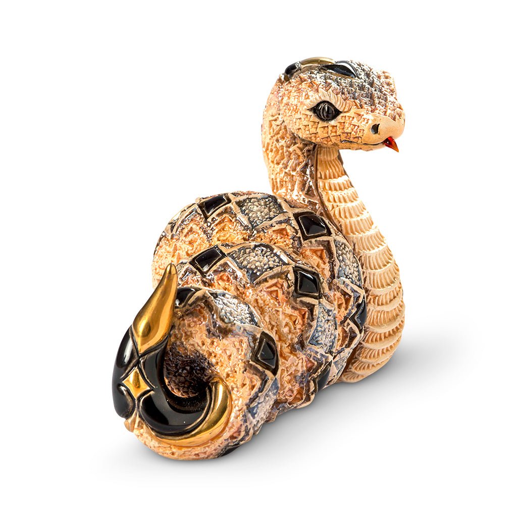 Artisan Ceramic Snake Sculpture. Hand‑Painted Coiled Snake Figurine. Gold‑Accent Ceramic Snake Decor. Enamel Glazed Snake Statue. Uruguayan Craft Ceramic Serpent. Hand‑Carved Snake Home Accent. Snake Transformation Symbol Figurine. Tabletop Ceramic Animal Sculpture