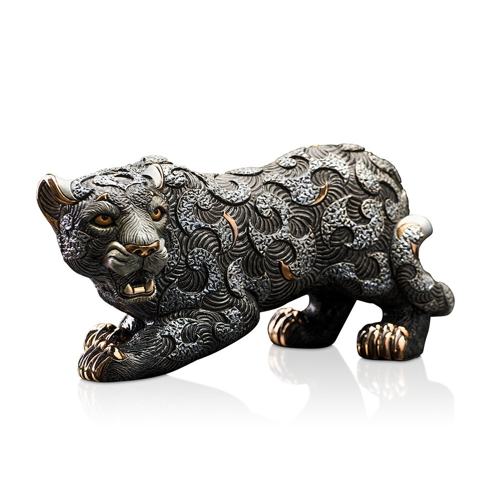 Ceramic panther; fine animal figurine and decorative sculpture. Hand-painted detailing, gold and platinum accents, and limited edition. High-end animal sculpture, symbolic art piece, and heritage ceramic. Ideal for luxury interiors, classic decor themes, or cultural collections, it also appeals to those interested in animals with mythic or spiritual significance