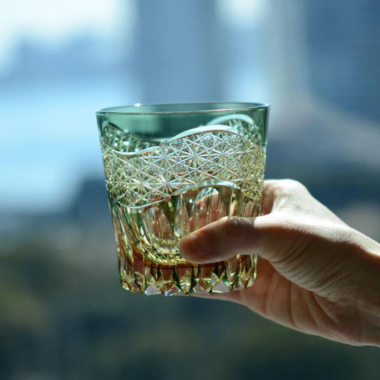 Edo Kiriko glass, Kagami Crystal Kasaneirome Gyoko, Japanese cut glass green crystal, morning light Edo Kiriko tumbler, Satoshi Nabetani glass design, handcrafted Japanese crystalware, traditional Edo cut glass Japan, Kasaneirome layered color technique, Japanese luxury crystal glass, symbolic Japanese glassware, collectible Edo Kiriko art glass, green gold crystal tumbler Japan