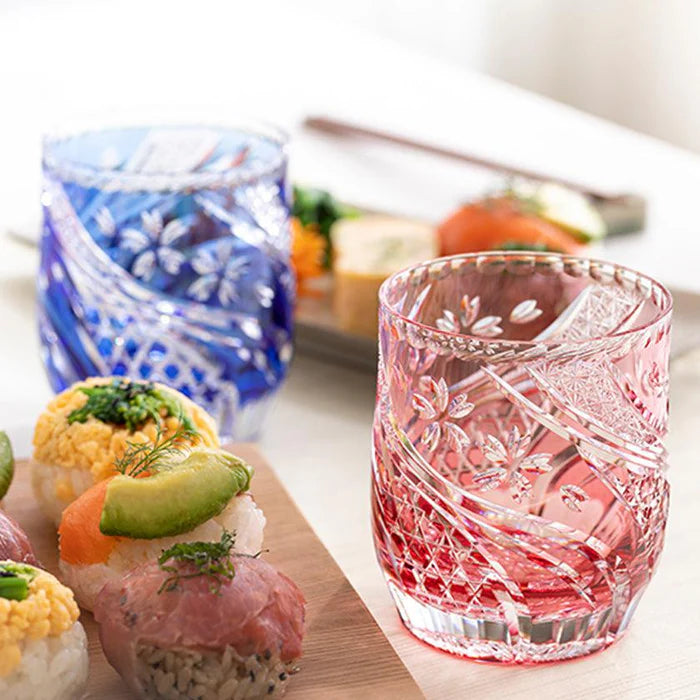 Edo Kiriko whiskey glasses, Sakura Nagare glass, Kagami Crystal Japan, Japanese cherry blossom glass, red and blue whiskey tumblers, Edo cut glass pair, handcrafted Japanese glassware, whiskey glass Edo Kiriko, sake glass Japan, Kagome cut pattern, Kiku Tsunagi design, Japanese crystal barware, cherry blossom whiskey glass set, luxury Japanese drinkware