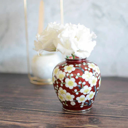 Owari cloisonne vase, Japanese cloisonne plum blossom, red cloisonne enamel vase, Kato Shippo vase, Japanese enamel art, plum blossom decorative vase, wired cloisonne Meiji style, handcrafted Japanese cloisonne, small Japanese collectible vase, Aichi cloisonne craft, traditional Japanese plum design, spherical cloisonne vase, luxury Japanese home decor, enamel art vase Japan, wired enamel plum vase.