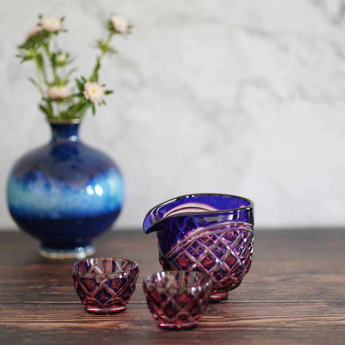 Satsuma Kiriko glass, Satsuma cut glass pitcher set, Satsuma Vidro crystal, Japanese cut glass sake set, double-layer overlay glass, lapis lazuli and gold red crystal, handmade Japanese drinkware, Kagoshima glassware, Satsuma Kiriko sake pitcher, artisan Japanese glass, paulownia box gift set, symbolic Japanese tableware, luxury Japanese glass set, traditional Japanese cut crystal