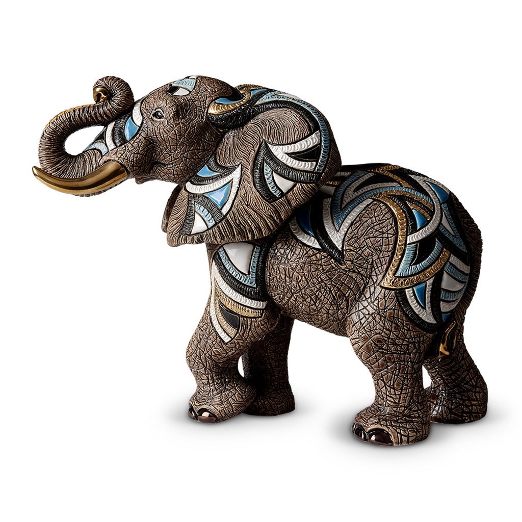This collectible elephant sculpture suits lovers of wildlife art, fine ceramics, and limited-edition home accents. It appeals to collectors of animal figurines, art gallery pieces, and handcrafted décor. Ceramic elephant statue, limited edition wildlife sculpture, handmade animal art.