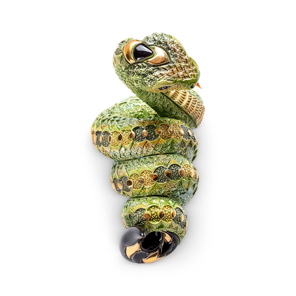 Artisan Ceramic Snake Sculpture. Hand‑Painted Coiled Snake Figurine. Gold‑Accent Ceramic Snake Decor. Enamel Glazed Snake Statue. Uruguayan Craft Ceramic Serpent. Hand‑Carved Snake Home Accent. Snake Transformation Symbol Figurine. Tabletop Ceramic Animal Sculpture