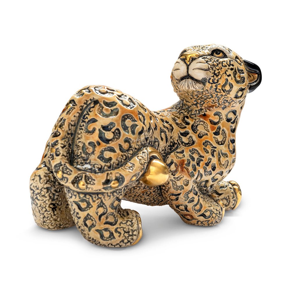 Black Panther ceramic figurine. Handcrafted panther sculpture. Panther statue. Symbolic animal figurine. Panther decor collectible. Uruguayan ceramic art. Black and gold panther statue. Handmade wildlife sculpture. Elegant animal totem figurine. Artisan ceramic panther. Gold-accented panther ornament. Black jungle cat figurine. Collectible predator statue.