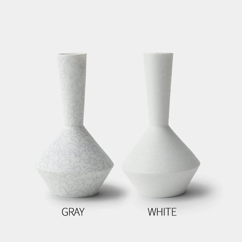 Foo Tokyo porcelain vase, Japanese porcelain flower vase, Mino Gifu handcrafted vase, acanthus motif vase, karakusa pattern vase, gray porcelain vase Japan, white porcelain vase Japan, modern Japanese home decor, single flower porcelain vase, minimalist Japanese vase, artisan handmade porcelain vase, symbolic Japanese ceramic, contemporary Japanese pottery