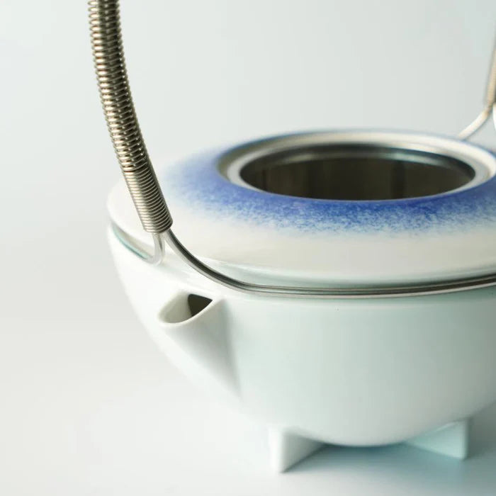 Japanese porcelain teapot, Imari Arita ware teapot, Studio Wieki Somers teapot, modern Japanese teapot, porcelain teapot with handle, designer Japanese teapot, cobalt blue teapot, lapis lazuli porcelain teapot, Japanese tea ceremony teapot, Imari porcelain tea set, Saga Prefecture porcelain, Japanese pottery collaboration, contemporary Japanese teaware, handmade porcelain teapot, luxury Japanese teapot.