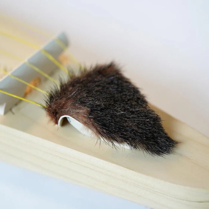 Ainu Tonkori, traditional Ainu instrument, Japanese Indigenous string instrument, Karafuto Ainu Tonkori, Sakhalin fir wood Tonkori, Ainu crafts Hokkaido, handmade Tonkori, Indigenous Japanese music instrument, Tonkori five-string koto, Hayasaka Masaga Tonkori, Ainu carving traditions, cultural instrument Japan, Tonkori music heritage, rare Japanese instrument