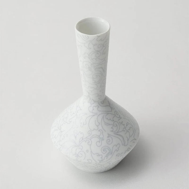 Foo Tokyo porcelain vase, Japanese porcelain flower vase, Mino Gifu handcrafted vase, acanthus motif vase, karakusa pattern vase, gray porcelain vase Japan, white porcelain vase Japan, modern Japanese home decor, single flower porcelain vase, minimalist Japanese vase, artisan handmade porcelain vase, symbolic Japanese ceramic, contemporary Japanese pottery