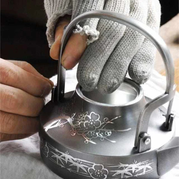Japanese tea set, ibushi tin tea set, Osaka Naniwa pewter ware, Japanese pewter tea cups, handmade Japanese tea set, traditional tea ceremony set, Japanese tea caddy, Japanese tin teapot, artisan tea set Japan, paulownia wood box tea set, Edo period tea ware, pewter tea set Japan, Japanese tea culture, Japanese traditional crafts, Osaka Suzuki tea set.