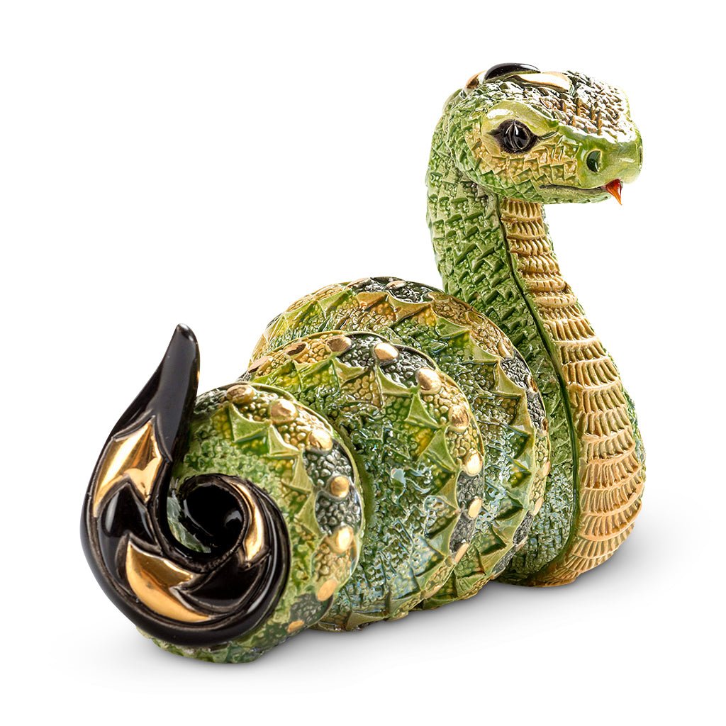 Artisan Ceramic Snake Sculpture. Hand‑Painted Coiled Snake Figurine. Gold‑Accent Ceramic Snake Decor. Enamel Glazed Snake Statue. Uruguayan Craft Ceramic Serpent. Hand‑Carved Snake Home Accent. Snake Transformation Symbol Figurine. Tabletop Ceramic Animal Sculpture