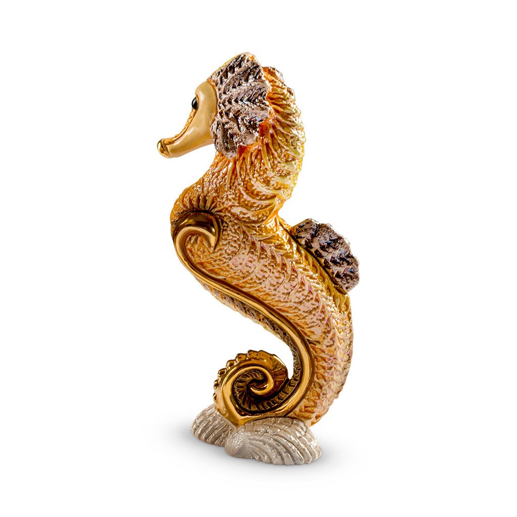 Handcrafted ceramic seahorse figurine with platinum and gold accents, 8×5×14 cm handmade in Uruguay, vibrant enamel glaze details; unique artisanal marine sculpture for coastal décor, gift boxed with authenticity certificate, ideal for collectors and nautical interiors.