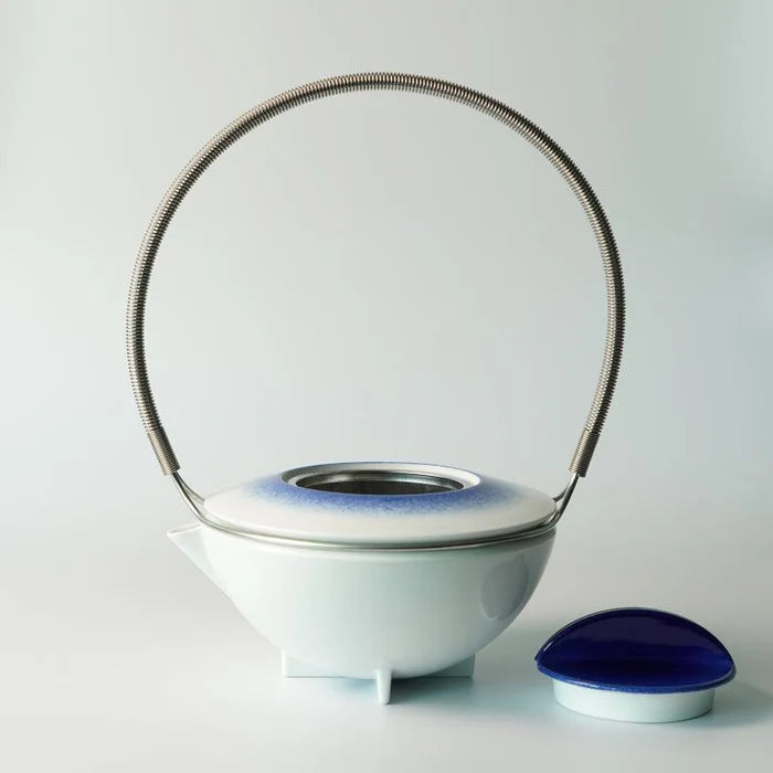 Japanese porcelain teapot, Imari Arita ware teapot, Studio Wieki Somers teapot, modern Japanese teapot, porcelain teapot with handle, designer Japanese teapot, cobalt blue teapot, lapis lazuli porcelain teapot, Japanese tea ceremony teapot, Imari porcelain tea set, Saga Prefecture porcelain, Japanese pottery collaboration, contemporary Japanese teaware, handmade porcelain teapot, luxury Japanese teapot.