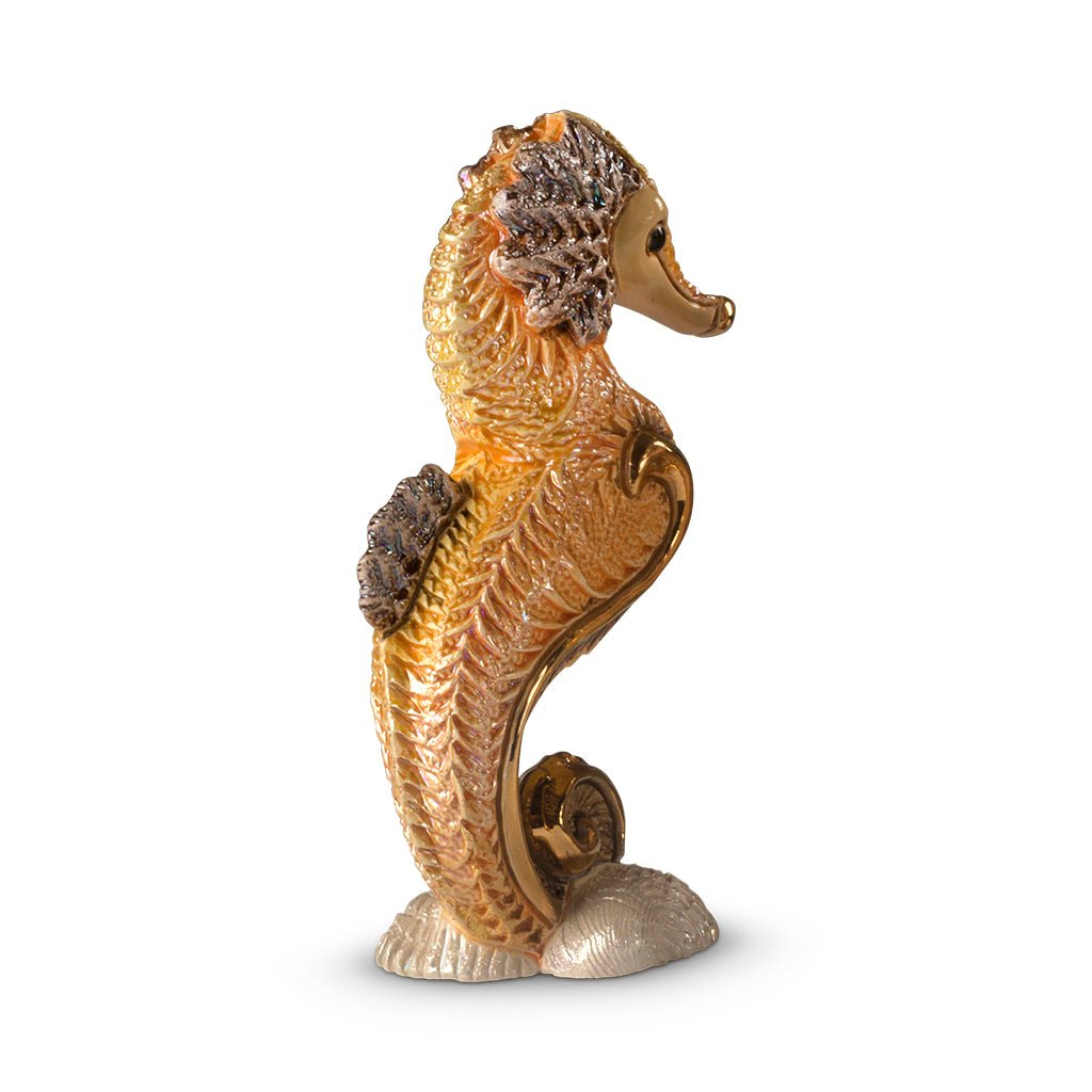 Handcrafted ceramic seahorse figurine with platinum and gold accents, 8×5×14 cm handmade in Uruguay, vibrant enamel glaze details; unique artisanal marine sculpture for coastal décor, gift boxed with authenticity certificate, ideal for collectors and nautical interiors.