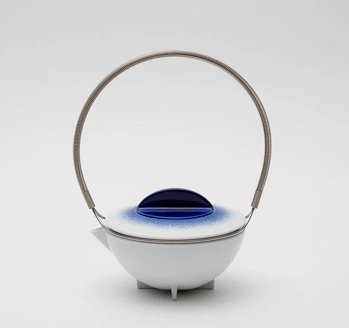 Japanese porcelain teapot, Imari Arita ware teapot, Studio Wieki Somers teapot, modern Japanese teapot, porcelain teapot with handle, designer Japanese teapot, cobalt blue teapot, lapis lazuli porcelain teapot, Japanese tea ceremony teapot, Imari porcelain tea set, Saga Prefecture porcelain, Japanese pottery collaboration, contemporary Japanese teaware, handmade porcelain teapot, luxury Japanese teapot.