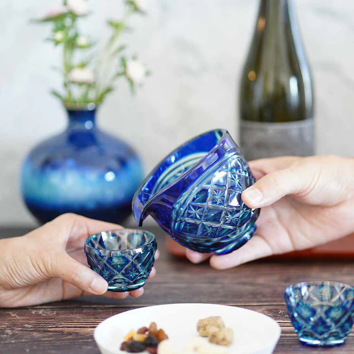 Satsuma Kiriko glass, Satsuma cut glass pitcher set, Satsuma Vidro crystal, Japanese cut glass sake set, double-layer overlay glass, lapis lazuli and gold red crystal, handmade Japanese drinkware, Kagoshima glassware, Satsuma Kiriko sake pitcher, artisan Japanese glass, paulownia box gift set, symbolic Japanese tableware, luxury Japanese glass set, traditional Japanese cut crystal