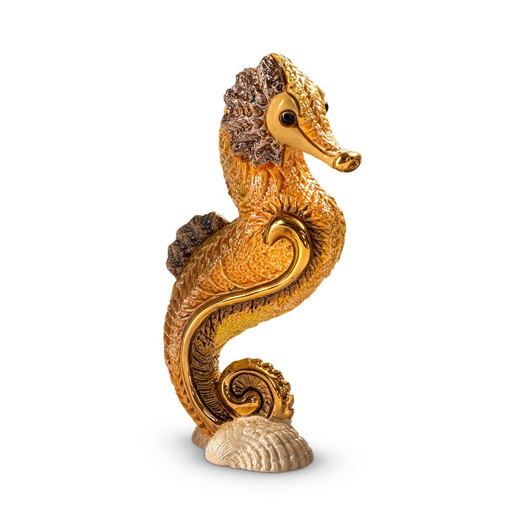 Handcrafted ceramic seahorse figurine with platinum and gold accents, 8×5×14 cm handmade in Uruguay, vibrant enamel glaze details; unique artisanal marine sculpture for coastal décor, gift boxed with authenticity certificate, ideal for collectors and nautical interiors.