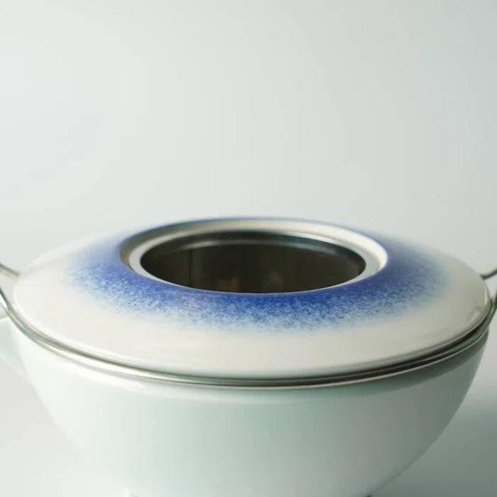 Japanese porcelain teapot, Imari Arita ware teapot, Studio Wieki Somers teapot, modern Japanese teapot, porcelain teapot with handle, designer Japanese teapot, cobalt blue teapot, lapis lazuli porcelain teapot, Japanese tea ceremony teapot, Imari porcelain tea set, Saga Prefecture porcelain, Japanese pottery collaboration, contemporary Japanese teaware, handmade porcelain teapot, luxury Japanese teapot.