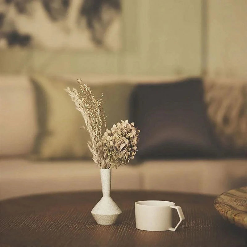 Foo Tokyo porcelain vase, Japanese porcelain flower vase, Mino Gifu handcrafted vase, acanthus motif vase, karakusa pattern vase, gray porcelain vase Japan, white porcelain vase Japan, modern Japanese home decor, single flower porcelain vase, minimalist Japanese vase, artisan handmade porcelain vase, symbolic Japanese ceramic, contemporary Japanese pottery