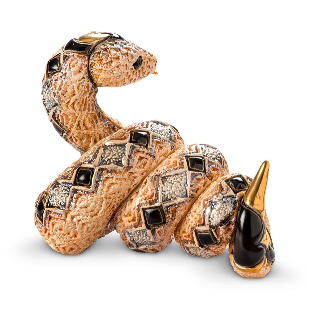Artisan Ceramic Snake Sculpture. Hand‑Painted Coiled Snake Figurine. Gold‑Accent Ceramic Snake Decor. Enamel Glazed Snake Statue. Uruguayan Craft Ceramic Serpent. Hand‑Carved Snake Home Accent. Snake Transformation Symbol Figurine. Tabletop Ceramic Animal Sculpture