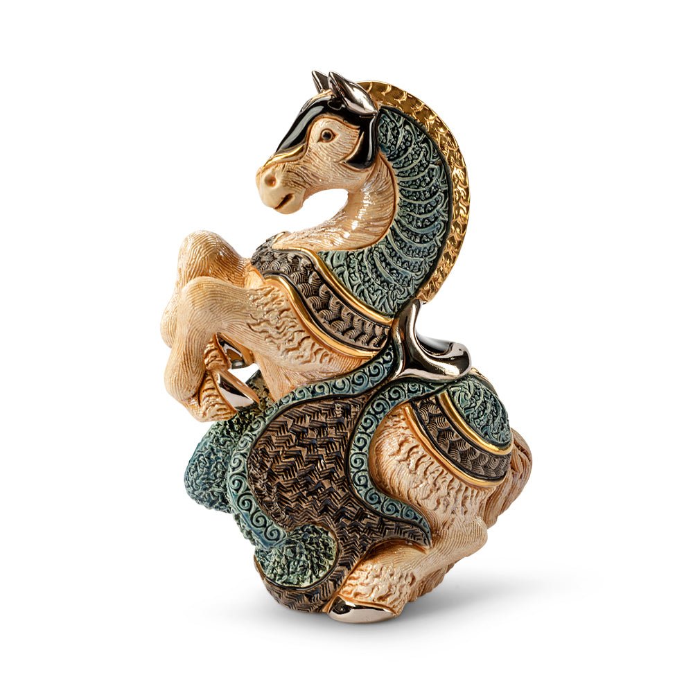 Hand-painted white jousting horse sculpture with platinum & gold armor. Handcrafted collectible figurine, 10x7x14 cm. Symbol of courage & nobility.