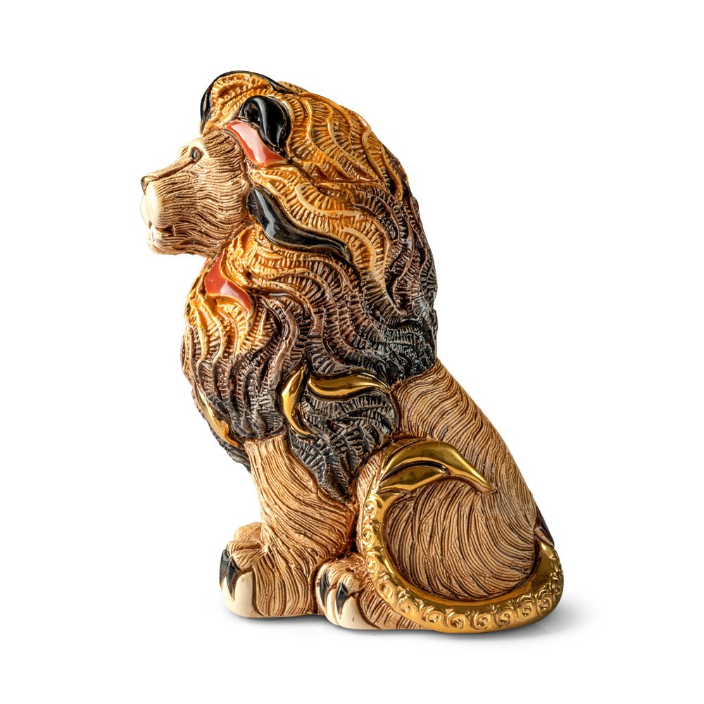 Hand‑carved wooden sculpture with enamel and metallic accents. Artisan animal figurine for home décor, office display, or shelf art. Luxury decorative sculpture made in Uruguay, small batch, collectible. Unique collector’s piece with vibrant glaze and precious metal luster. Premium gift item for those who love wildlife art and handcrafted objects