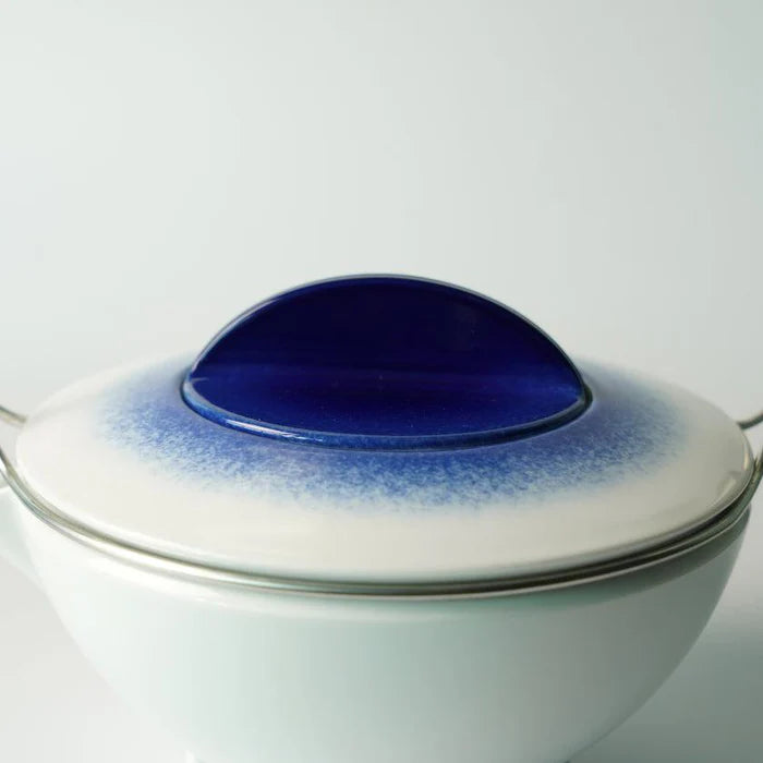 Japanese porcelain teapot, Imari Arita ware teapot, Studio Wieki Somers teapot, modern Japanese teapot, porcelain teapot with handle, designer Japanese teapot, cobalt blue teapot, lapis lazuli porcelain teapot, Japanese tea ceremony teapot, Imari porcelain tea set, Saga Prefecture porcelain, Japanese pottery collaboration, contemporary Japanese teaware, handmade porcelain teapot, luxury Japanese teapot.