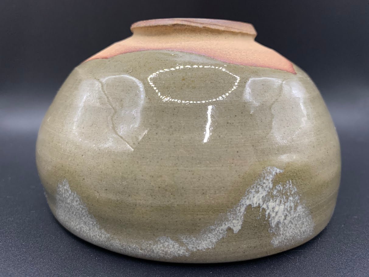 Japanese celadon pottery, handmade celadon tea bowl, ribbed ceramic tea bowl, carved leaf motif pottery, traditional Japanese ceramics, Longquan-style celadon ware, matcha chawan bowl, artisanal tea ceremony bowl, crackle glaze pottery, Song dynasty style ceramics, Japanese green glaze bowl, hand-thrown Japanese pottery, tea culture ceramics, Japanese chawan design, antique-style Japanese bowl, leaf pattern pottery, ribbed matcha bowl, celadon carving techniques, Japanese celadon glaze art, traditional Japa