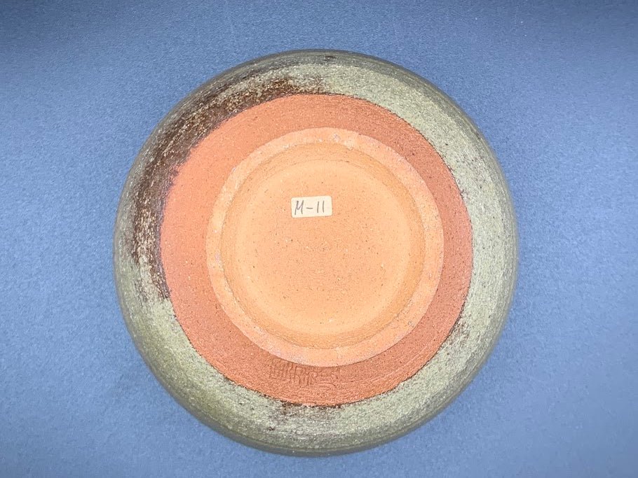 Japanese celadon pottery, handmade celadon tea bowl, ribbed ceramic tea bowl, carved leaf motif pottery, traditional Japanese ceramics, Longquan-style celadon ware, matcha chawan bowl, artisanal tea ceremony bowl, crackle glaze pottery, Song dynasty style ceramics, Japanese green glaze bowl, hand-thrown Japanese pottery, tea culture ceramics, Japanese chawan design, antique-style Japanese bowl, leaf pattern pottery, ribbed matcha bowl, celadon carving techniques, Japanese celadon glaze art, traditional Japa