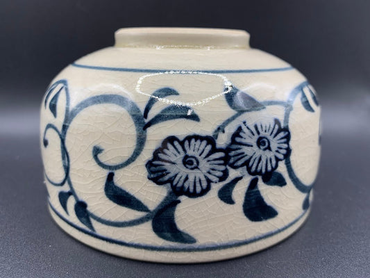 Japanese celadon pottery, handmade celadon tea bowl, ribbed ceramic tea bowl, carved leaf motif pottery, traditional Japanese ceramics, Longquan-style celadon ware, matcha chawan bowl, artisanal tea ceremony bowl, crackle glaze pottery, Song dynasty style ceramics, Japanese green glaze bowl, hand-thrown Japanese pottery, tea culture ceramics, Japanese chawan design, antique-style Japanese bowl, leaf pattern pottery, ribbed matcha bowl, celadon carving techniques, Japanese celadon glaze art, traditional Japa