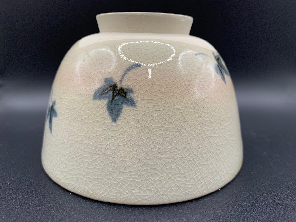 Japanese celadon pottery, handmade celadon tea bowl, ribbed ceramic tea bowl, carved leaf motif pottery, traditional Japanese ceramics, Longquan-style celadon ware, matcha chawan bowl, artisanal tea ceremony bowl, crackle glaze pottery, Song dynasty style ceramics, Japanese green glaze bowl, hand-thrown Japanese pottery, tea culture ceramics, Japanese chawan design, antique-style Japanese bowl, leaf pattern pottery, ribbed matcha bowl, celadon carving techniques, Japanese celadon glaze art, traditional Japa