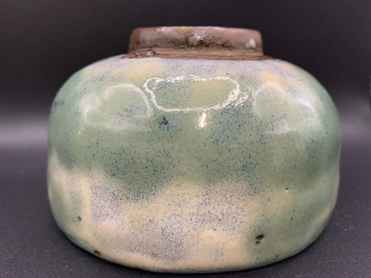 Japanese celadon pottery, handmade celadon tea bowl, ribbed ceramic tea bowl, carved leaf motif pottery, traditional Japanese ceramics, Longquan-style celadon ware, matcha chawan bowl, artisanal tea ceremony bowl, crackle glaze pottery, Song dynasty style ceramics, Japanese green glaze bowl, hand-thrown Japanese pottery, tea culture ceramics, Japanese chawan design, antique-style Japanese bowl, leaf pattern pottery, ribbed matcha bowl, celadon carving techniques, Japanese celadon glaze art, traditional Japa