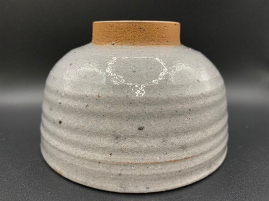 Japanese celadon pottery, handmade celadon tea bowl, ribbed ceramic tea bowl, carved leaf motif pottery, traditional Japanese ceramics, Longquan-style celadon ware, matcha chawan bowl, artisanal tea ceremony bowl, crackle glaze pottery, Song dynasty style ceramics, Japanese green glaze bowl, hand-thrown Japanese pottery, tea culture ceramics, Japanese chawan design, antique-style Japanese bowl, leaf pattern pottery, ribbed matcha bowl, celadon carving techniques, Japanese celadon glaze art, traditional Japa