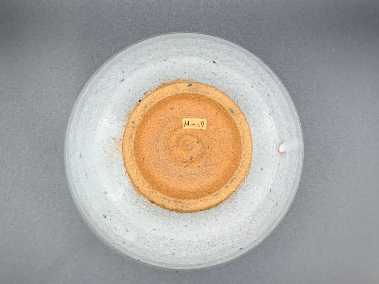Japanese celadon pottery, handmade celadon tea bowl, ribbed ceramic tea bowl, carved leaf motif pottery, traditional Japanese ceramics, Longquan-style celadon ware, matcha chawan bowl, artisanal tea ceremony bowl, crackle glaze pottery, Song dynasty style ceramics, Japanese green glaze bowl, hand-thrown Japanese pottery, tea culture ceramics, Japanese chawan design, antique-style Japanese bowl, leaf pattern pottery, ribbed matcha bowl, celadon carving techniques, Japanese celadon glaze art, traditional Japa