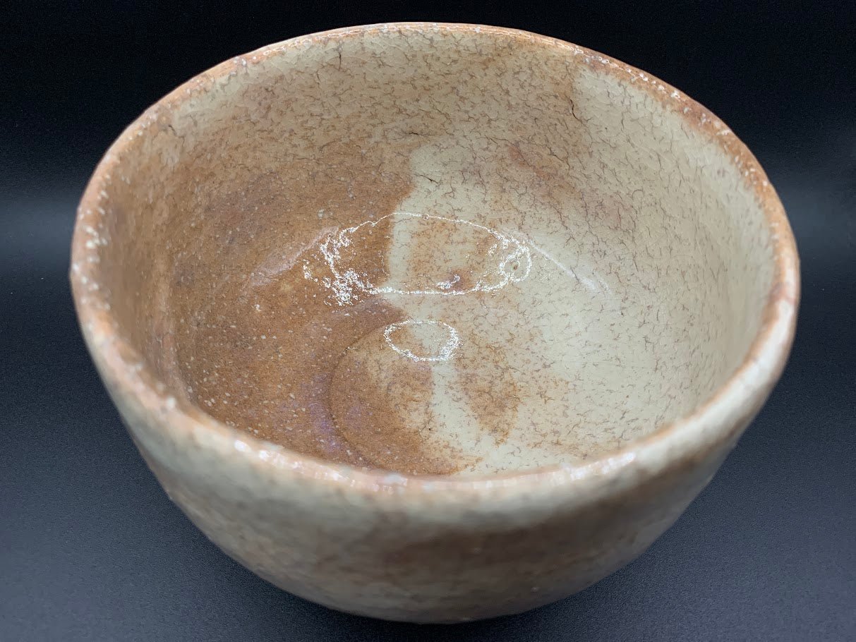 Japanese celadon pottery, handmade celadon tea bowl, ribbed ceramic tea bowl, carved leaf motif pottery, traditional Japanese ceramics, Longquan-style celadon ware, matcha chawan bowl, artisanal tea ceremony bowl, crackle glaze pottery, Song dynasty style ceramics, Japanese green glaze bowl, hand-thrown Japanese pottery, tea culture ceramics, Japanese chawan design, antique-style Japanese bowl, leaf pattern pottery, ribbed matcha bowl, celadon carving techniques, Japanese celadon glaze art, traditional Japa