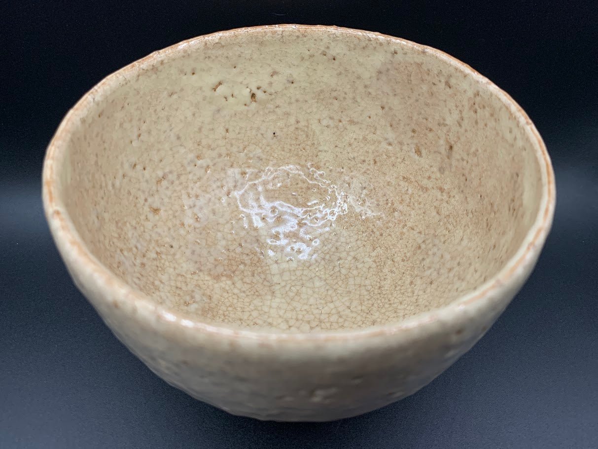 Japanese celadon pottery, handmade celadon tea bowl, ribbed ceramic tea bowl, carved leaf motif pottery, traditional Japanese ceramics, Longquan-style celadon ware, matcha chawan bowl, artisanal tea ceremony bowl, crackle glaze pottery, Song dynasty style ceramics, Japanese green glaze bowl, hand-thrown Japanese pottery, tea culture ceramics, Japanese chawan design, antique-style Japanese bowl, leaf pattern pottery, ribbed matcha bowl, celadon carving techniques, Japanese celadon glaze art, traditional Japa